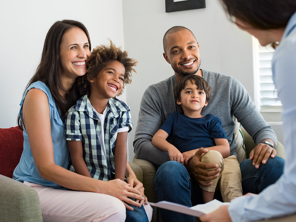 Parents at a therapy session with their kids