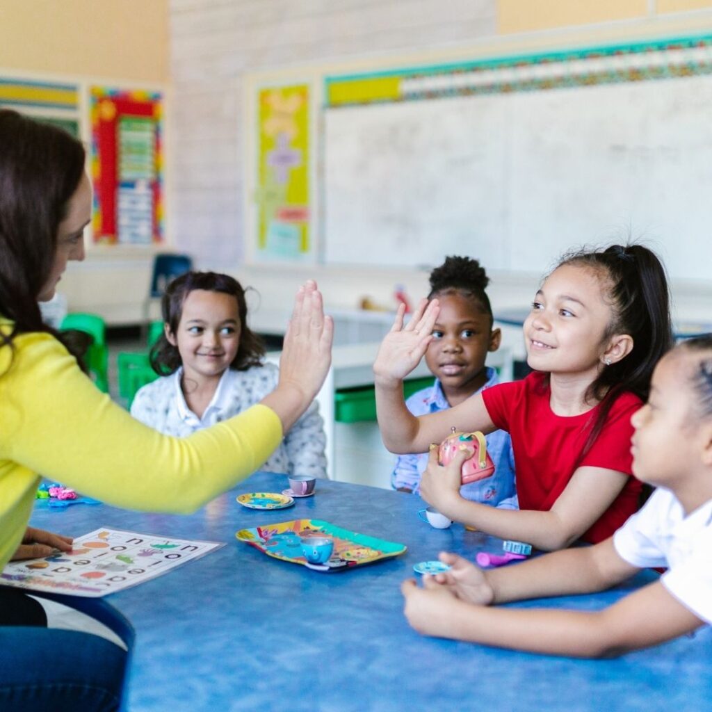 Autistic children learning together in a classroom.