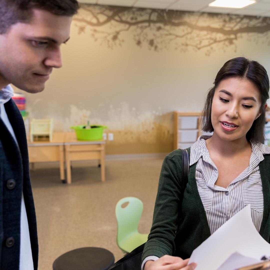 Teacher meeting with parent