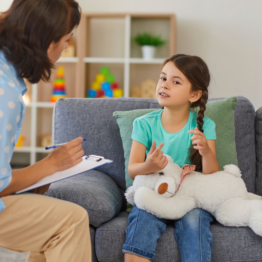girl with ADHD speaking with therapist