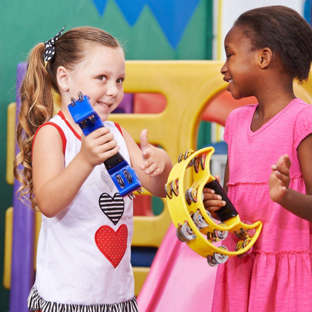 Two girls with musical instruments