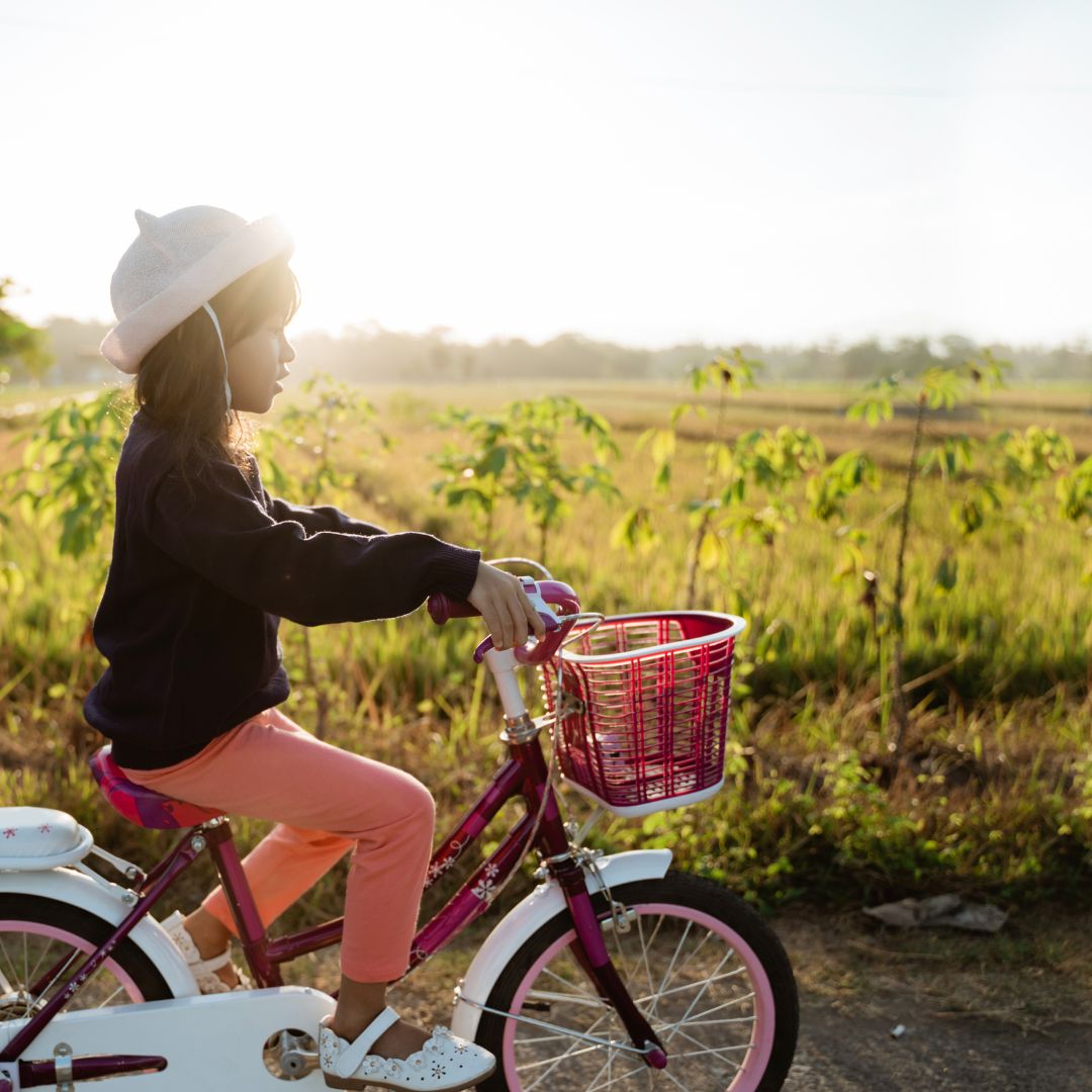 Young girl riding a bike