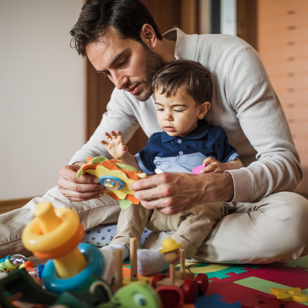 dad playing with child that has autism