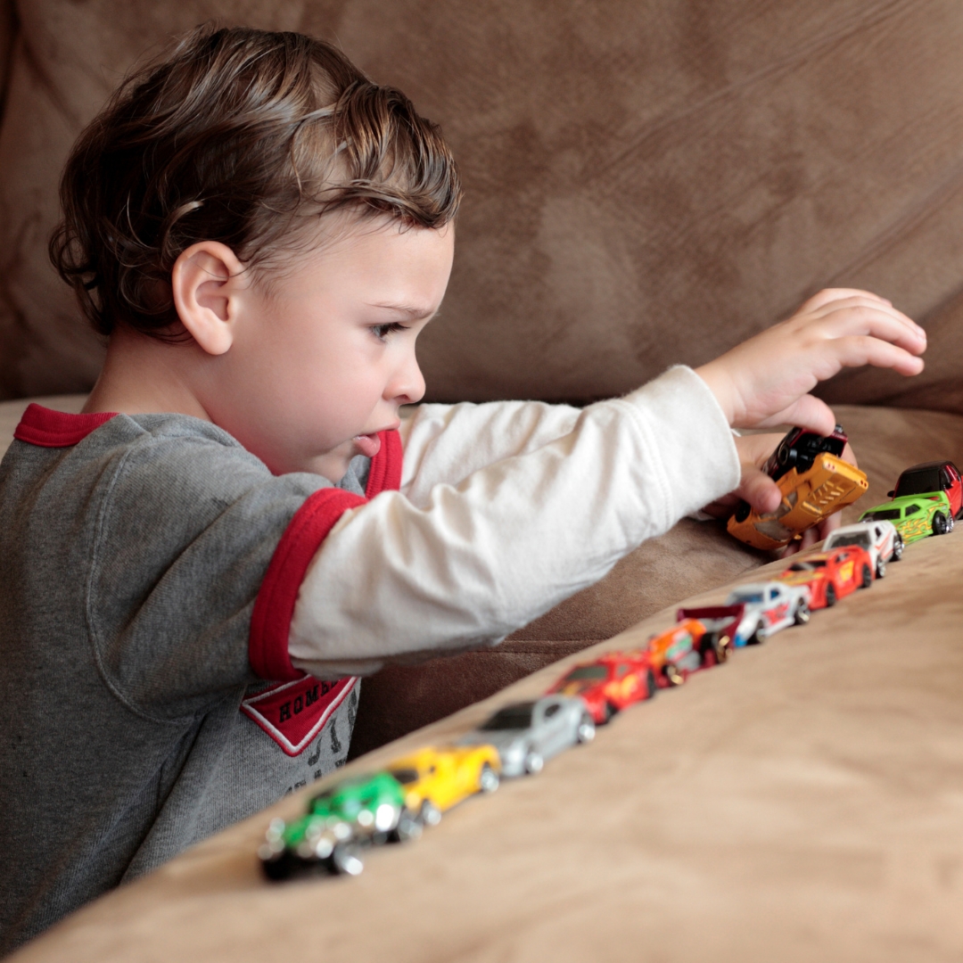 autistic child playing