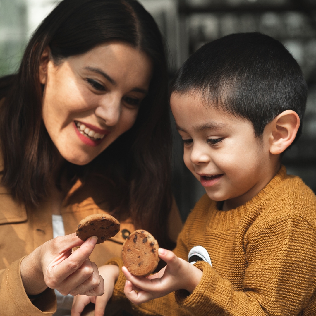 mother and son baking cookies