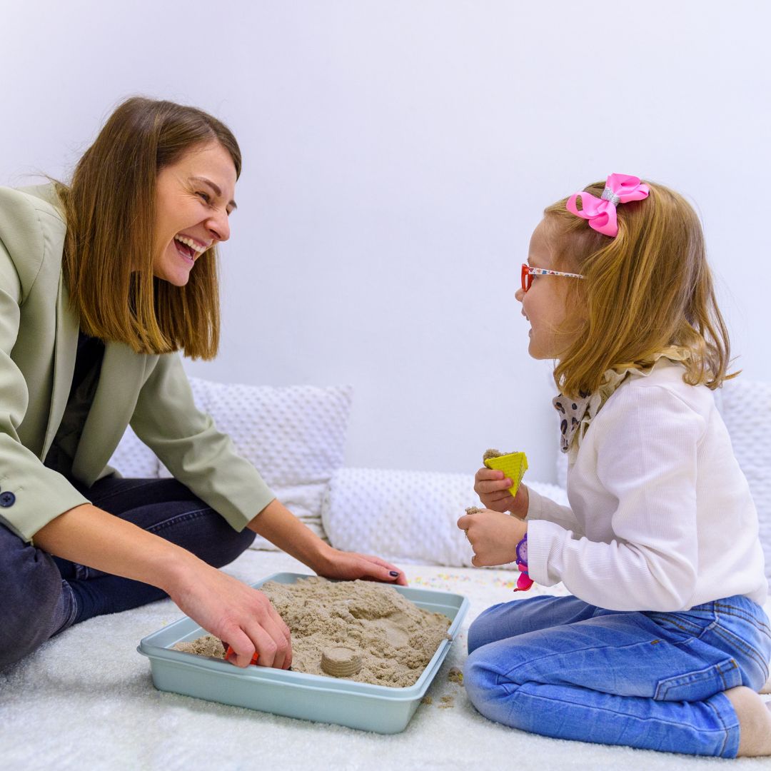 playing with therapy sand