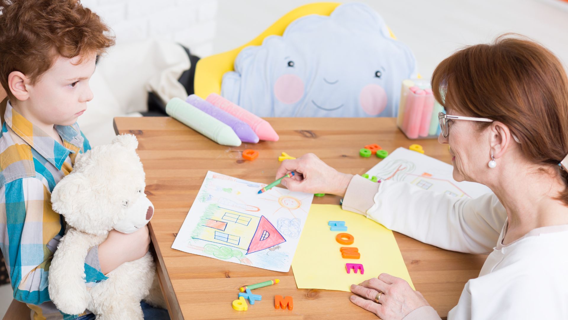 Boy interacting with therapist