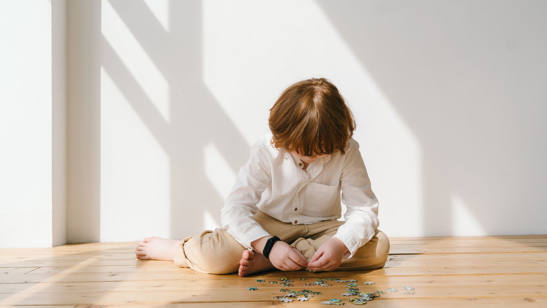 boy sitting on floor