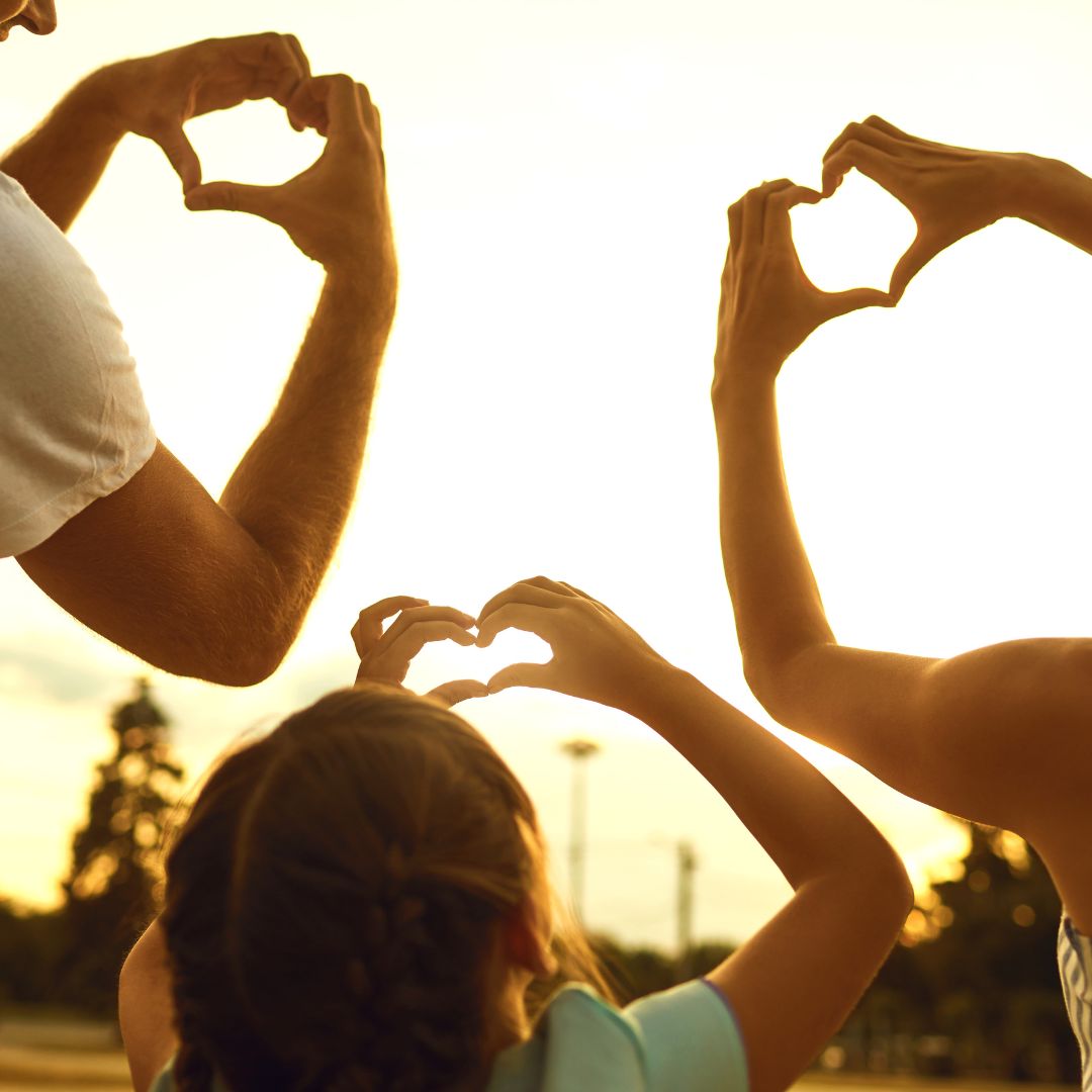 family making heart hands
