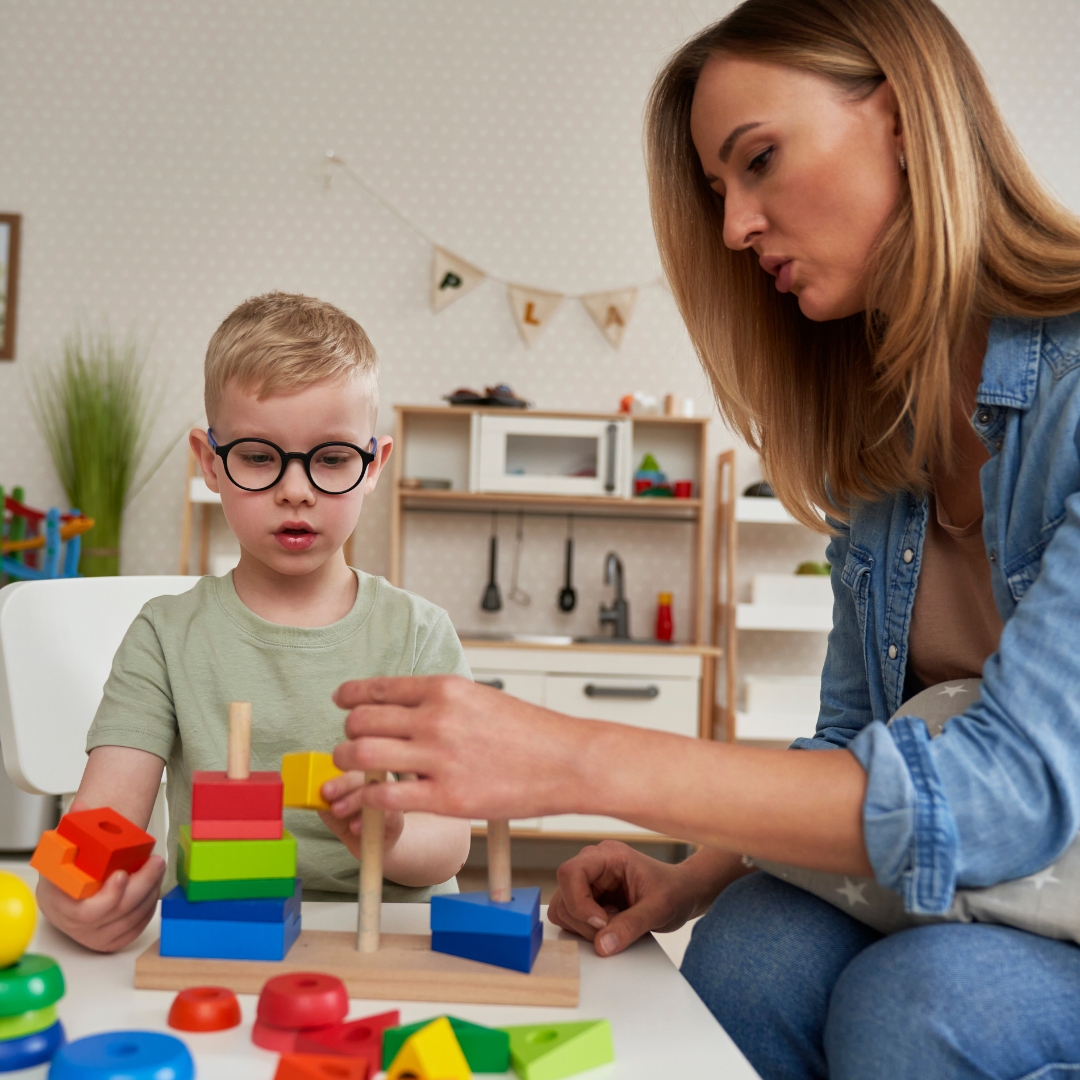 image of an autistic boy getting therapy