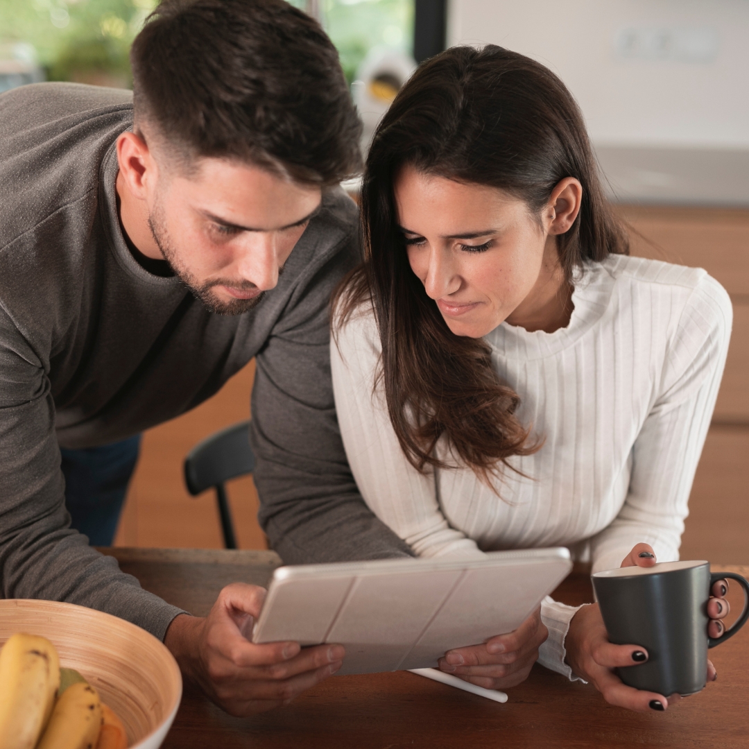 image of parents looking at data
